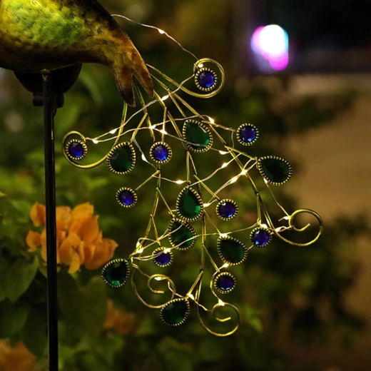 Sjajan paunov rep s LED-om