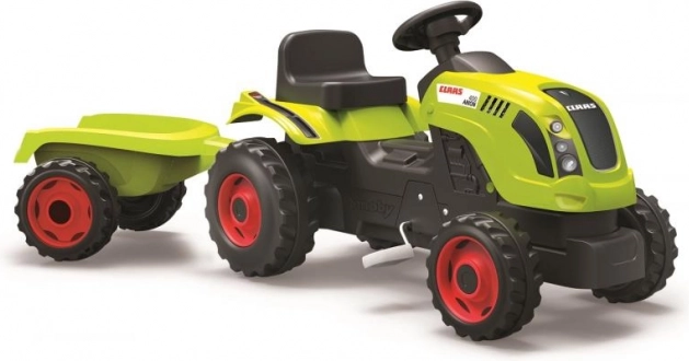 Traktor na pedale CLAAS sa zelenom prikolicom