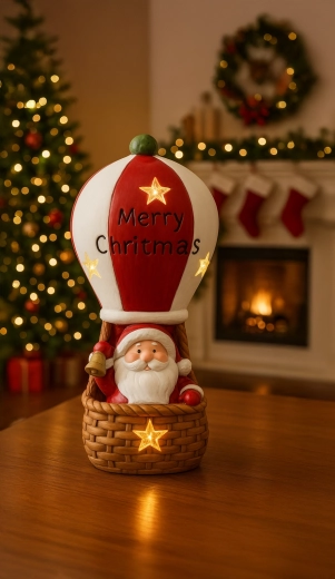 Božićna figurica Djed Božićnjak u toplozračnom balonu s LED svjetlima 20 × 20 × 43 cm