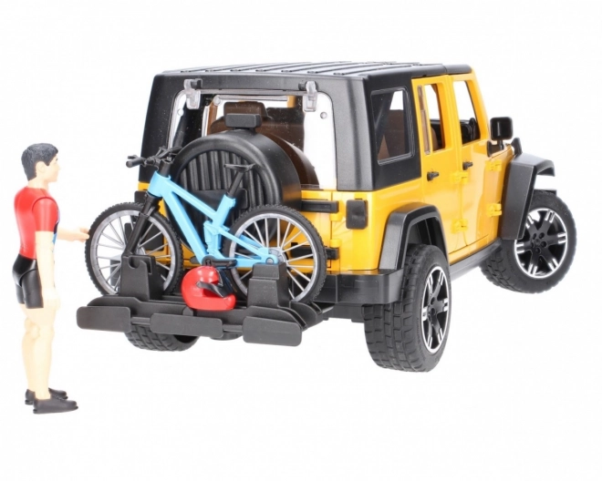 Bruder Jeep Wrangler Rubicon s biciklistom i biciklom