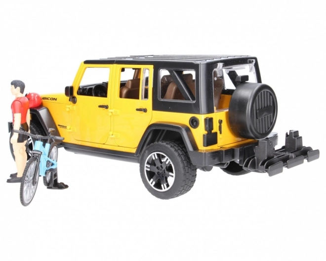 Bruder Jeep Wrangler Rubicon s biciklistom i biciklom