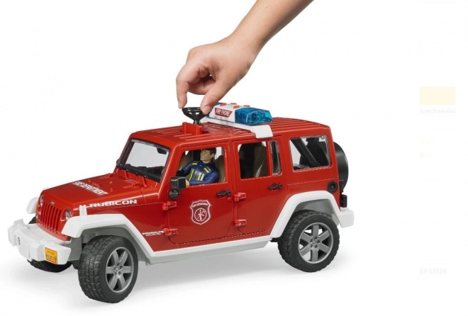 Bruder Crveni vatrogasni JEEP WRANGLER s figuricom i dodacima