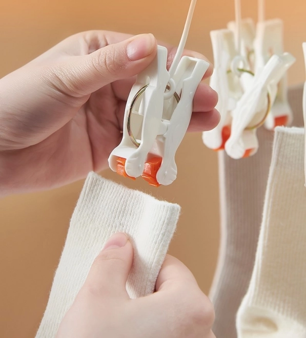 Plastična sklopiva vješalica za odjeću s kopčama - 19 kopči - bijela