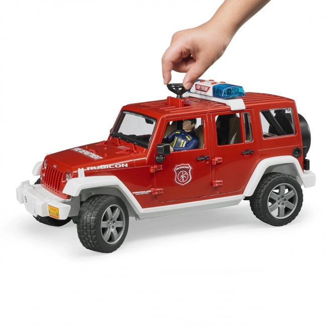 Bruder Crveni vatrogasni JEEP WRANGLER s figuricom i dodacima